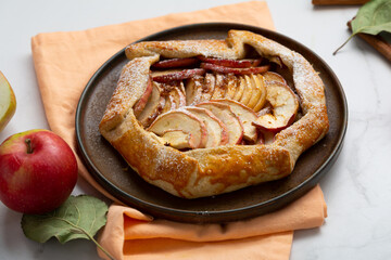 Autumn apple tart rustic food on plate pie
