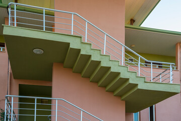 Outside Concrete stairs with a stainless handrails