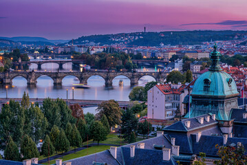 Fototapeta na wymiar Purple twilight above the bridges of Prague 
