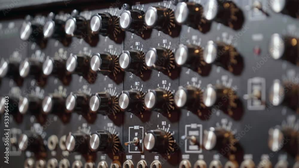 Aufkleber close up of light changing on audio buttons in professional sound recording studio