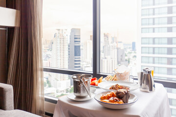 Breakfast serve on tray in luxury modern city hotel