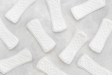 Menstrual cycle and protection concept with white pad, top view