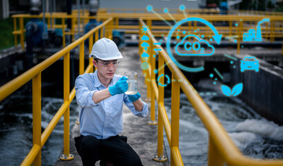 Worker under checking the waste water treatment pond industry large to control water support...