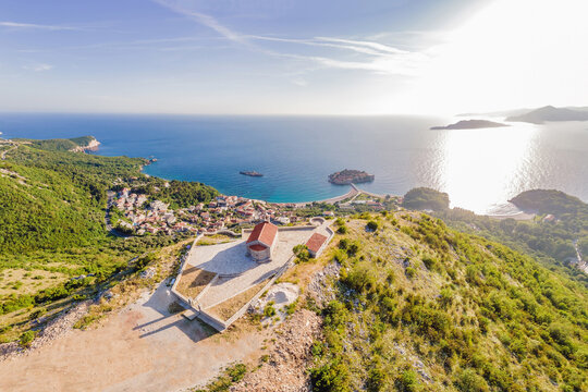 The Church of St. Sava in Montenegro, near the island of Sveti Stefan near Budwa. Drone view. Location: church St. Sava, Montenegro, Balkans, Adriatic sea, Europe Portrait of a disgruntled girl