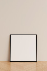 Clean and minimalist front view square black photo or poster frame mockup leaning against wall on wooden floor. 3d rendering.