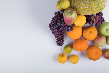 Summer fruits mix on a white background