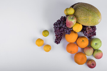 Summer fruits mix on a white background , top view