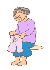 洗濯物をたたむ認知症の高齢女性のイラスト