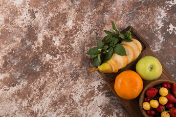 Fruit platter with mint on the marble in the corner