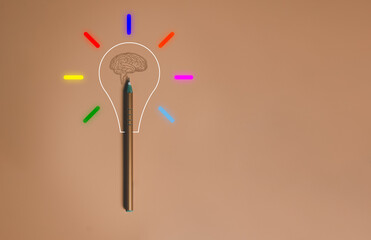 Creative thinking idea from Pen , Brain and light bulb glowing, sign of innovation, solution, education concept with copy space. 