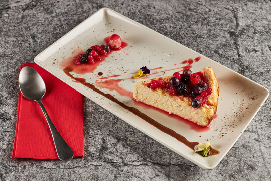 Plate with cheesecake in restaurant