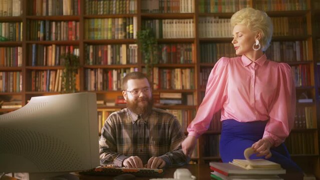 Funny female secretary flirting with system administrator at work, retro office