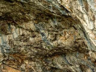 rock climbing route with cables and carabiner