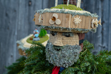 Silvesterchlausen or New Year Mummers in traditional costumes celebrating New Year in Urnasch. Appenzell, Switzerland