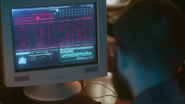 Nerdy guy in glasses hacking into computer, stealing secret data, retrofuturism