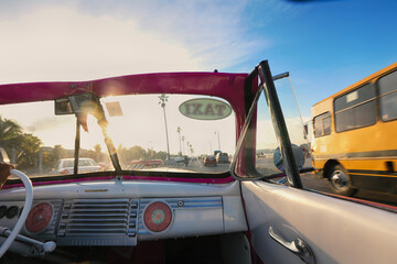 The interior of a pink Buick parked outside the Hotel Nacional de Cuba in Havana.American classic cars are often used as taxis for tourists in Havana.