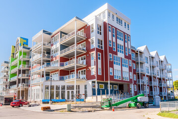 New apartment block still under construction on a clear autumn morning