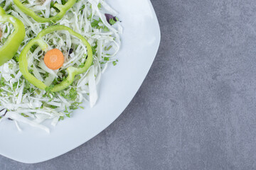 Sweet pepper carrot and vegetables , on the marble background