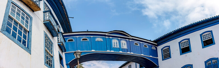 Icon of colonial architecture in Diamantina in the state of Minas Gerais, Casa da Glória with its suspended walkway connecting two historic houses