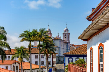 View of the historic center of the city of Diamantina with its colonial-style houses, church and palm trees