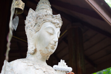 Head of Ancient statue in Temple of Thailand