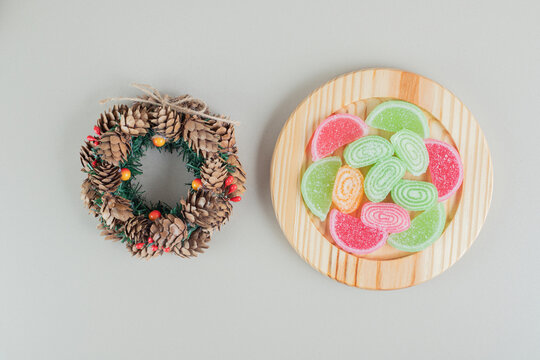 A Christmas wreath with colorful sugary marmalades