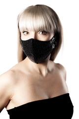 Beautiful brunette girl with blond hair fringe bangs wearing black fashionable protective face mask..