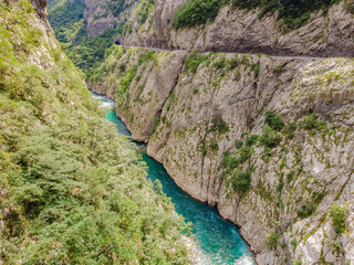 The purest waters of the turquoise color of the river Moraca flowing among the canyons. Travel around Montenegro concept