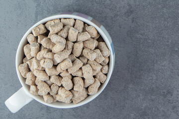 A bowl full of rye crispy cereals