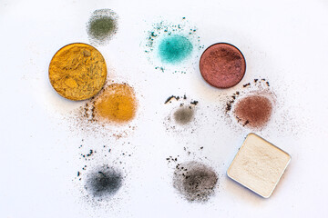Colored powder eyeshadows on white background, beauty 