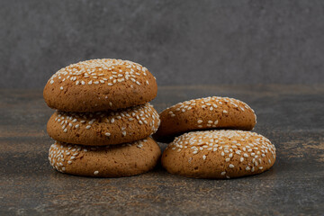 Cookies with sesame seeds on marble background