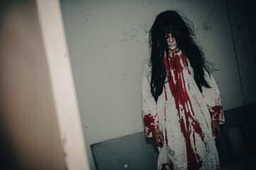 Portrait of asian woman make up ghost,Scary horror scene for background,Halloween festival...