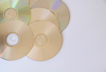 Top view of several CDs on a white background