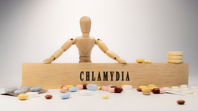 chlamydial disease. Written on wooden surface. On wood and medicine concept. white background. Diseases and treatments