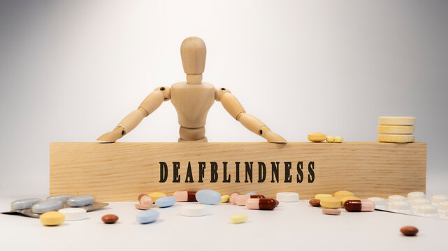 deafblindness disease. Written on wooden surface. On wood and medicine concept. white background. Diseases and treatments