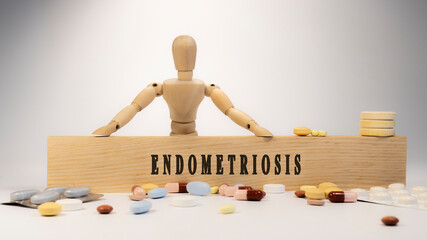endometriosis disease. Written on wooden surface. On wood and medicine concept. white background. Diseases and treatments