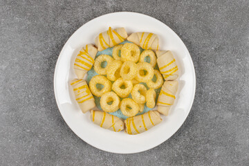 Two kinds of delicious sweets on white plate