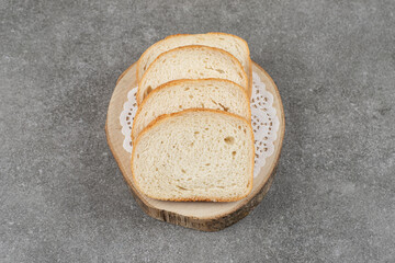 White bread slices on marble background