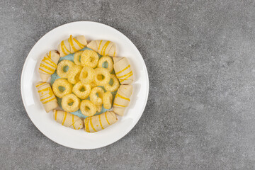 Two kinds of delicious sweets on white plate
