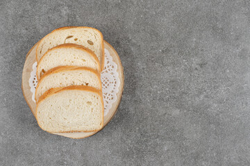 White bread slices on marble background