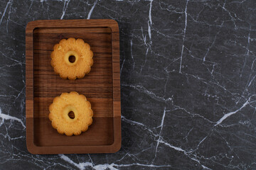 A small portion biscuit , on the marble background