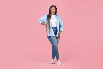 African American Plus Size Lady Model Posing Over Pink Background