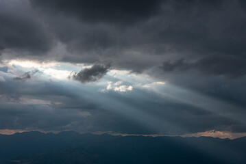 Rays of light passing trough the dark clouds.