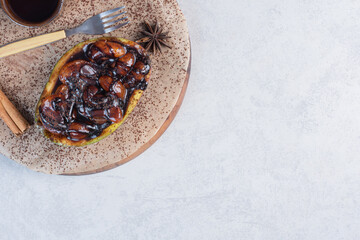 Home made sweet iwith avocado on wooden background