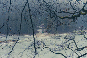 A panoramic view of a high mountain lake Synevir located in the Carpathian Mountains, Ukraine. Shot made in winter