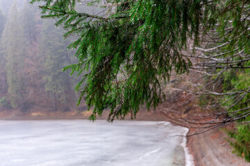 A panoramic view of a high mountain lake Synevir located in the Carpathian Mountains, Ukraine. Shot made in winter