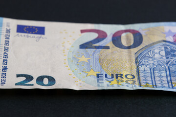 20 euro banknote close-up on a black table. Money background