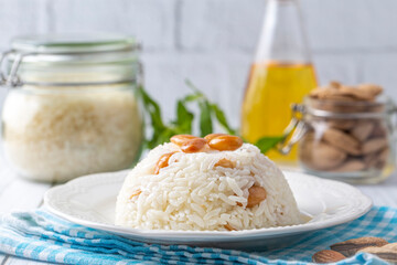 Traditional delicious Turkish food; Almond rice pilaf (Turkish name; Bademli pirinc pilavi)