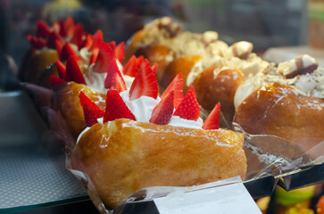 Neapolitan Baba Rum is a traditional Italian sweet. Fluffy pastry soaked in sweet rum syrup with...