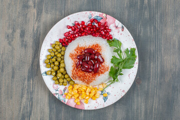 Delicious kidney beans with corns , peas and rice